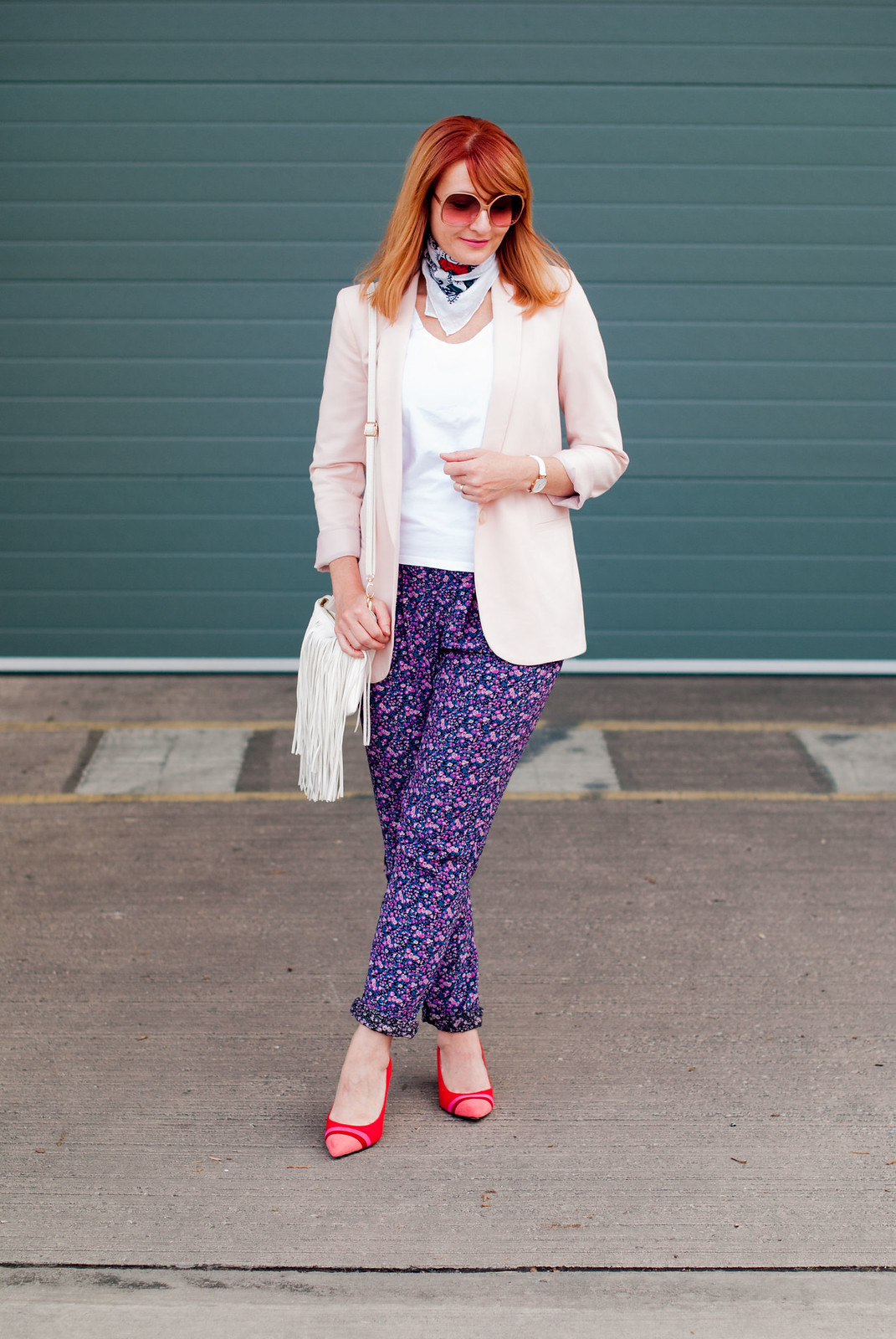 Summer dressing for cooler days: Pale pink blazer loose floral trousers red striped block heel shoes neck scarf white fringe cross body bag | Not Dressed As Lamb, over 40 style