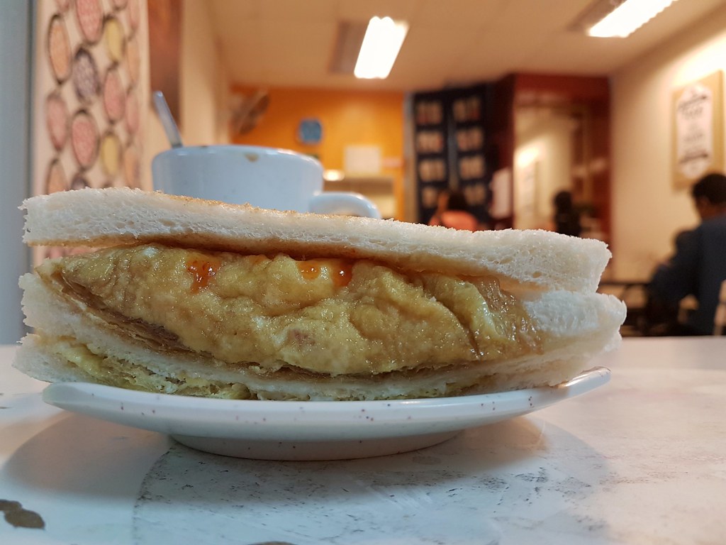 Sandwich toast w/twin egg  $4 Tea $2 @ Tesstaurant KL Cafe Wisma Cosway