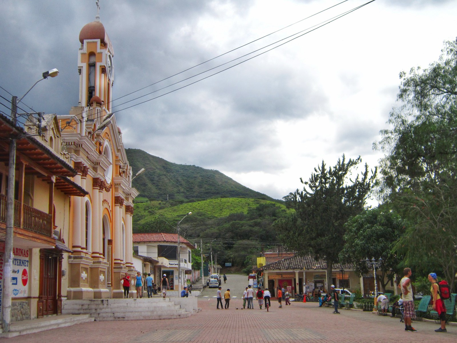 The main plaza and yellow painted church in Vilcabamba, Ecuador