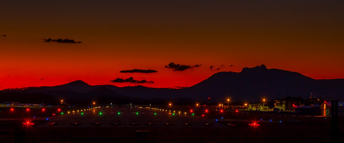 mountlarcom sunset gladstone centralqueensland queensland australia airport lights orange silhouette capricornia icon mountain landscape