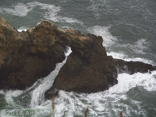 A sea arch at the Chimney Rock Overlook in Point Reyes National Seashore, California