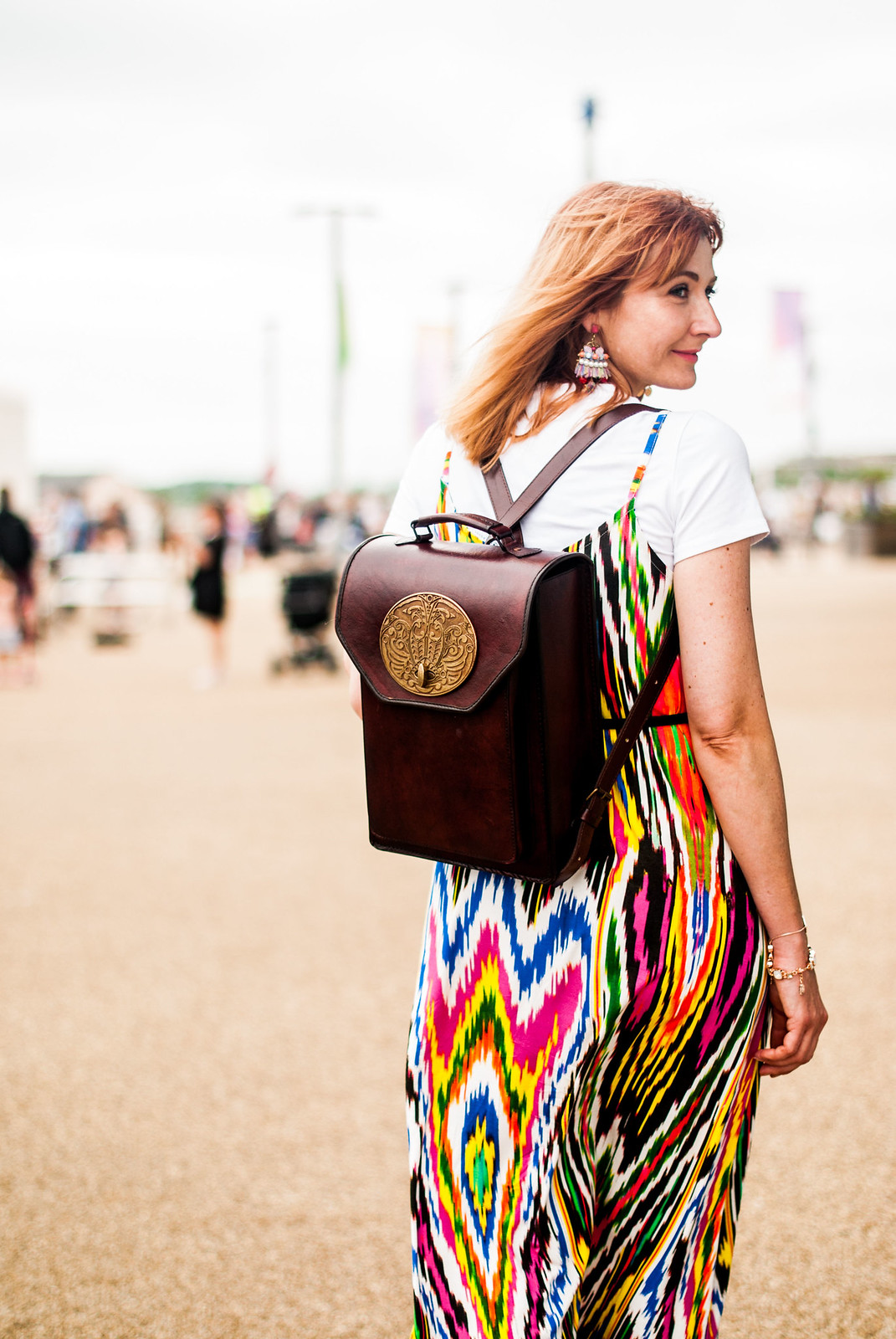 A rainbow-bright summer maxi dress styled in 90s style: Multi-coloured strappy maxi dress plain white t-shirt tee black wedge espadrilles Beara Beara brown leather backpack with antique brass plaque | Not Dressed As Lamb, over 40 style