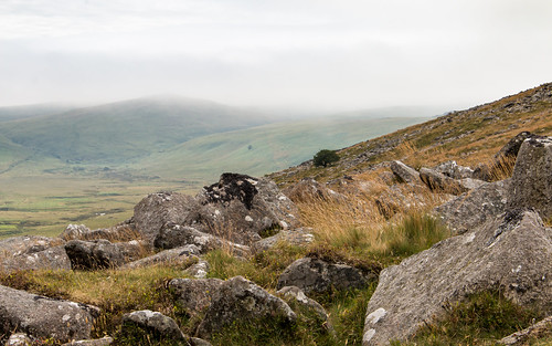 rock hill boulder strewn landscape dartmoor nationalpark mist lowcloud valley outdoor dull summer wilderness moorland