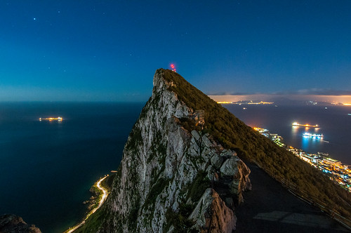starry night rock gibraltar formation top cliffs cliff promontory pillar hercules lights illuminated glow city trees nature europe africa morocco sea ocean mediterranean atlantic strait sky clear stars ships boats tankers shipping road traffic electricity contrast continent continents continental divide nikon d90 ceuta spain tangier coast coastal coastline high elevated view composite curved horizon january winter wintry 2017 energy consumption environment peak summit famous place outdoor cloud electric