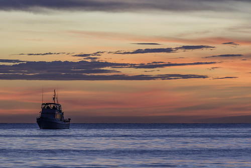 fourthofjuly naples beach gulfofmexico ocean fishingboat tranquil bluehour goldenhour sunset