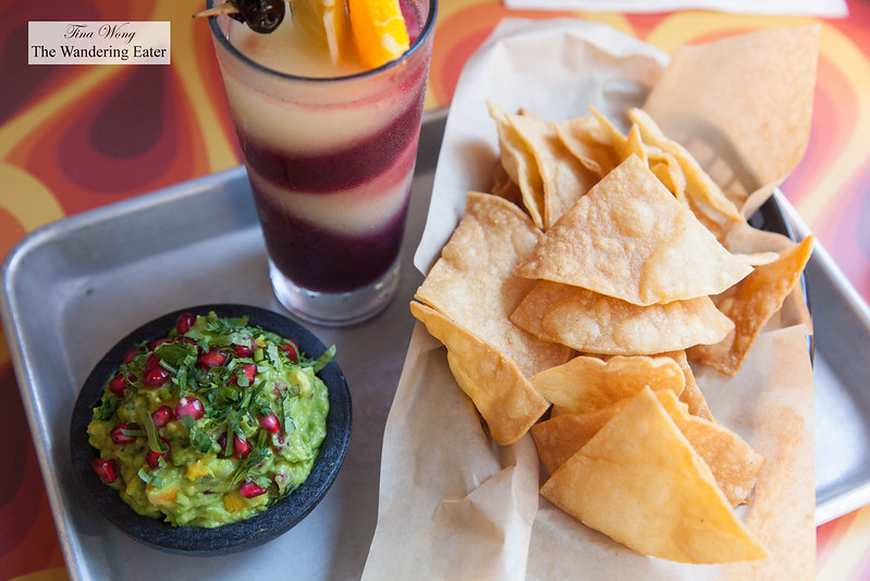 Pomegranate and mango guacamole with housemade tortilla chips with the Tsunami