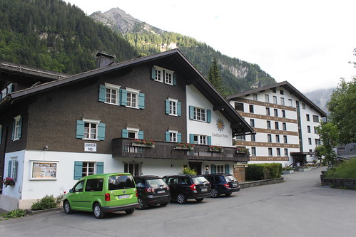 two hotels in brand with mountain in background
