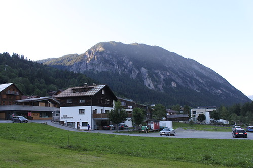 white building with mountains