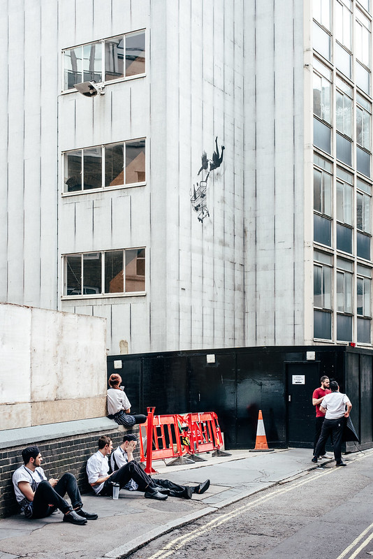 Falling Shopper by Banksy