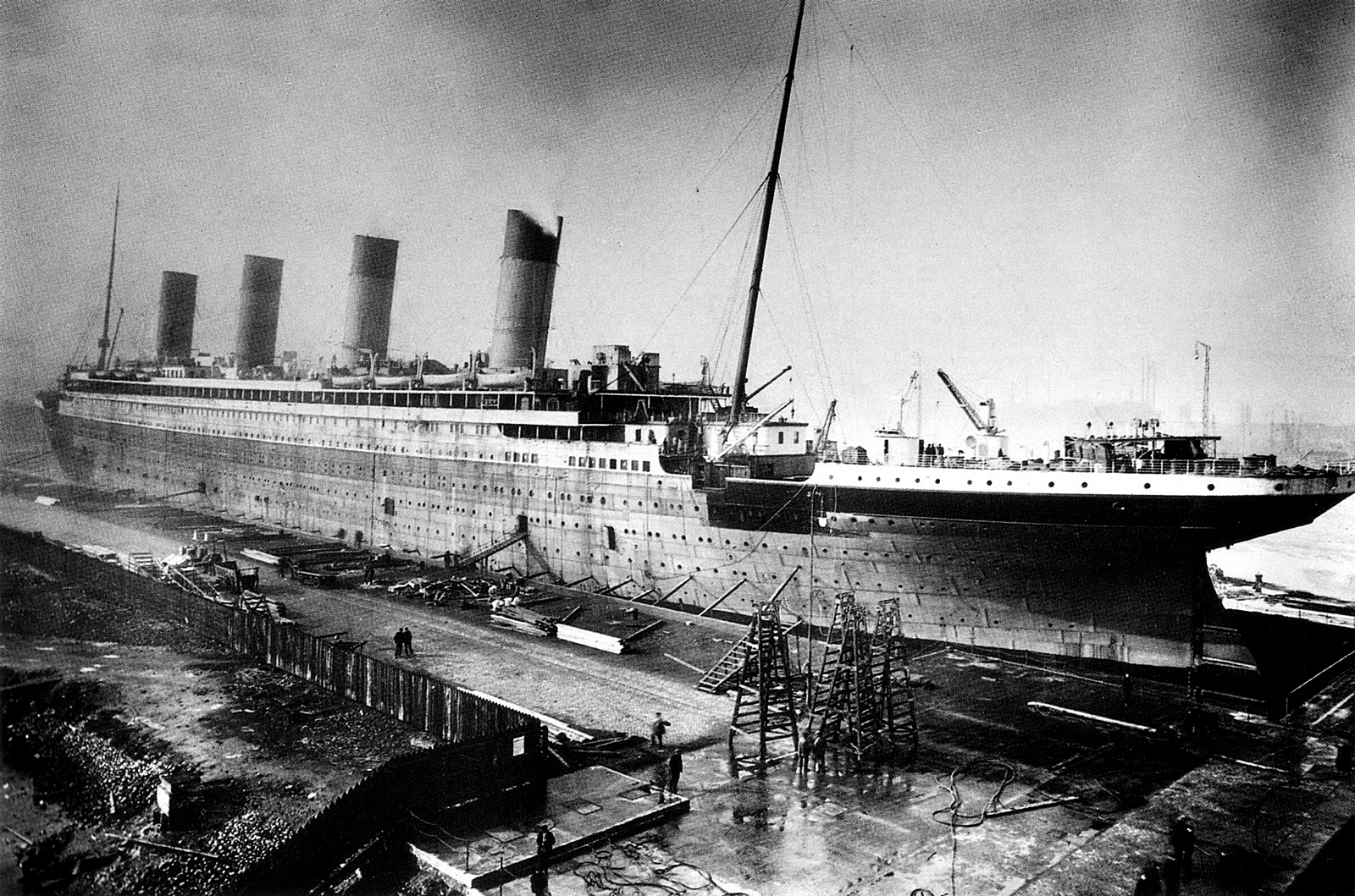 Titanic under construction in the fitting-out basin at Harland & Wolff, Belfast, 1911-1912
