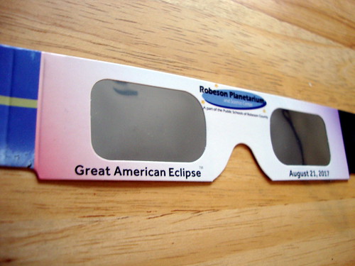lumberton nc northcarolina robesoncounty glasses viewingglasses eclipse greatamericaneclipse paper tabletop indoors inside sony cybershot dscw230 sunglasses robesonplanetarium planetarium sciencecenter project365 photooftheday photo365