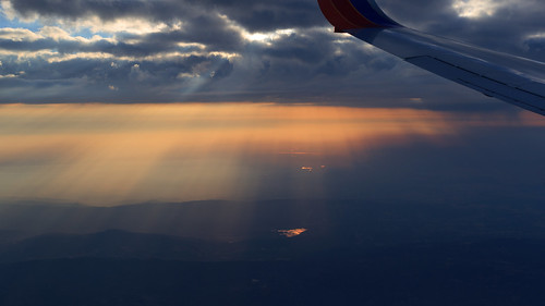 aerialphotography clouds california morning crepuscularrays smoke reflection orange airplane wing