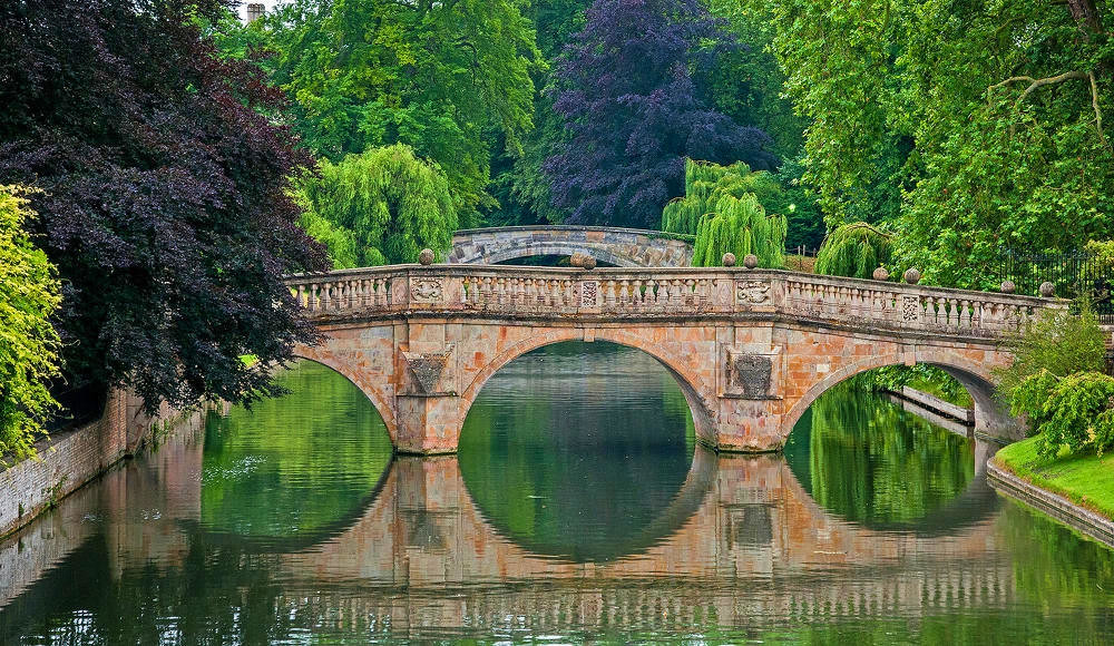 Clare Bridge reflected - Cambridge. Credit bvi4092