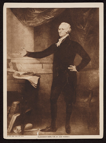 lexander Hamilton, full-length portrait, standing, facing left, left hand on hip, right arm extended outward, books and papers beside him. Reproduction of painting by John Trumbull, Prints and Photographs Division.