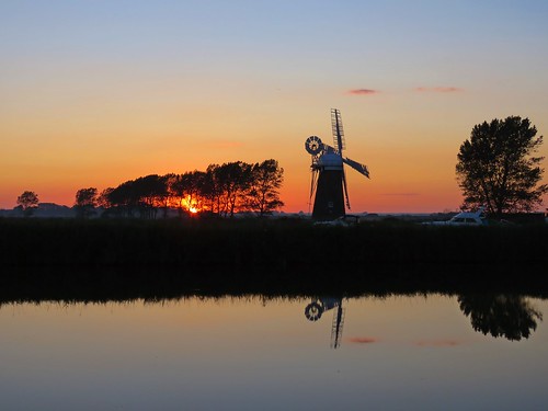 windmill nature fauna river sunset