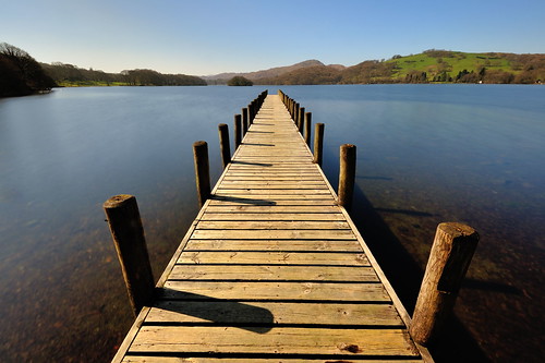 dead straight deadstraight parkamoor jetty coniston riggwood wooden posts wood boardwalk eastshore lake cumbria lakedistrict lakeland view scenic thelakes lakedistrictnationalpark nationaltrust fell fells cumbrian northwestengland mountains landscape imagestwiston district national park conistone countryside mountain water morning spring blue cloudless englishlakedistrict lakes thelakedistrict bright sunlight sun sunshine wideangle ultra wide angle ultrawide tranquil serene serenity prond le longexposure 10stopnd unesco worldheritagesite