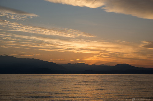 sonyslta99 sony sal2470z sun sunset sunrise sunbeams clouds mountain mountains lake lakegarda lagodigarda italy