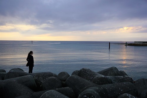 okinawa japan ryukyu kingdom asia island pacific ocean chatan prefecture sea wall seawall sunset tetrapods