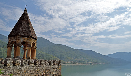 view nature sky mountain lake water cloud old church perspective ancient travel tourism georgia ananuri fortress