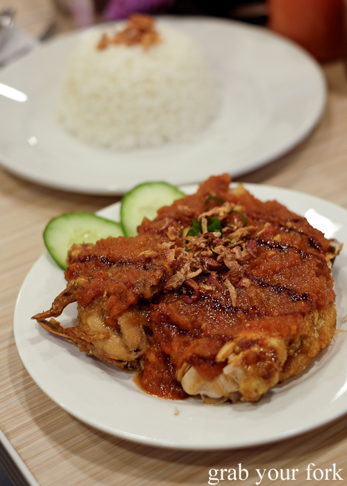 Ayam goreng penyet fried chicken with Javanese chilli sauce at Lestari Indonesian restaurant in Ultimo