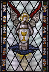 angel holding a chalice and host
