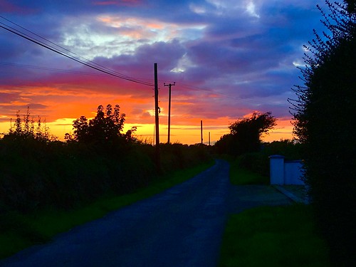 htt telegraphtuesday iphonese wexford ireland irish sunset sky colour telegraphpoles clouds lane road silhouettes