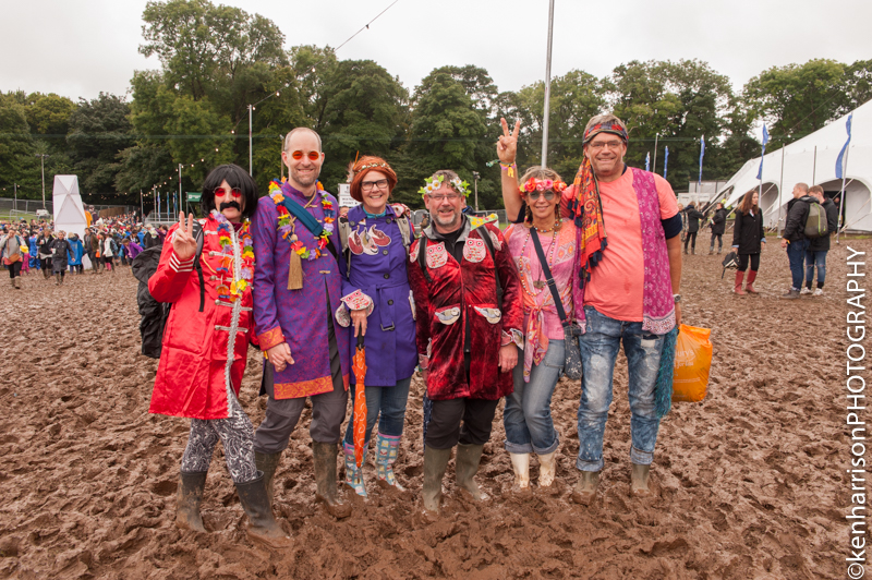Festival Goers in Fancy Dress brave the muddy conditions at Festival Number 6, Portmeirion, Wales 10th September, 2017.