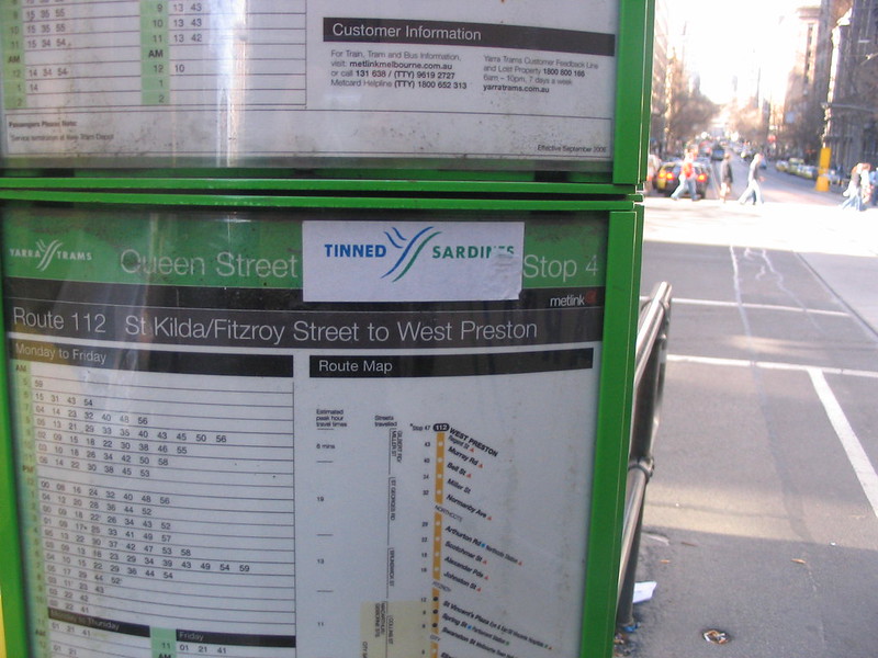 Sardines sticker on a tram stop timetable, August 2007