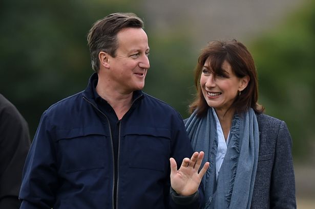 Prime-Minister-David-Cameron-and-his-wife-Samantha-watch-a-game-of-football-in-Chadlington
