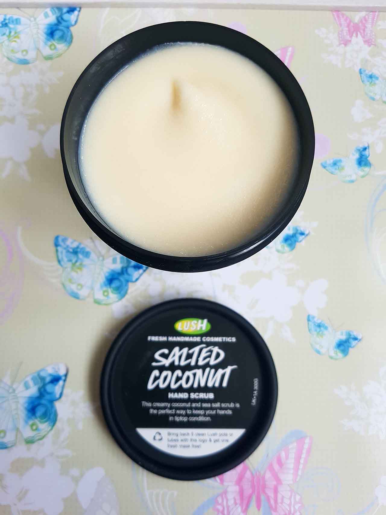 Lush Fresh Handmade Cosmetics – How Lush Are They: The Salted Coconut Hand Scrub - When I bought this scrub, I was suffering with dry skin on my hands and rough areas so I hoped this scrub would help to get rid of any flaky rough skin and moisturize at the same time. It contains argan oil, extra virgin coconut oil, sea salt and lemon infusion and can be used on wet and dry hands. I used it both ways and have to say it worked a treat! When used dry it is tougher on the skin but not in a damaging way – it simply works harder to remove the dead skin. When used wet it feels gentler but still leaves the hands feeling soft and smooth afterwards. Your hands also smell lovely and fresh for a while after use!