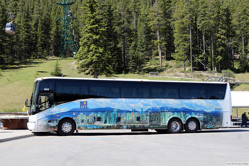APT tour coach depicting the Vancouver cityscape