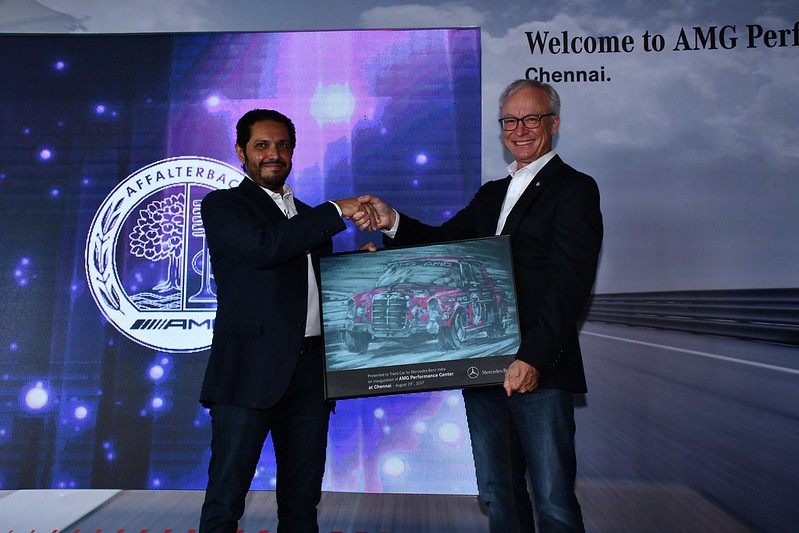 Mr. Roland Folger, MD & CEO, Mercedes−Benz India presenting Memento to Mr. Abdul Qadir, MD, Trans Car India at the inauguration of the AMG Performance Center in Chennai
