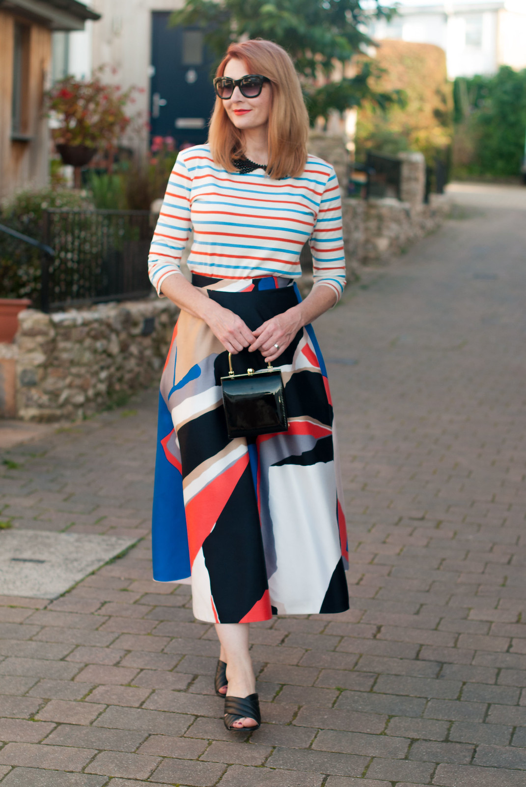 Ways to style a Breton stripe top: Date night/dressed up elegant outfit - with black collar necklace, graphic print full circle midi skirt and mules | Not Dressed As Lamb, over 40 style