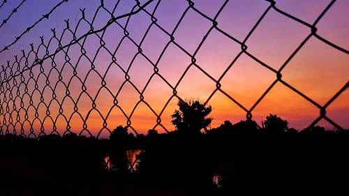 river mercedriver sunset fence purple water california