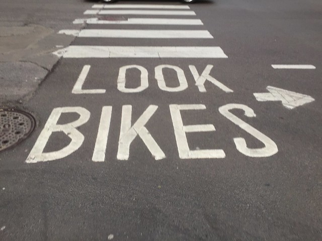 "Look bikes" painted on pavement