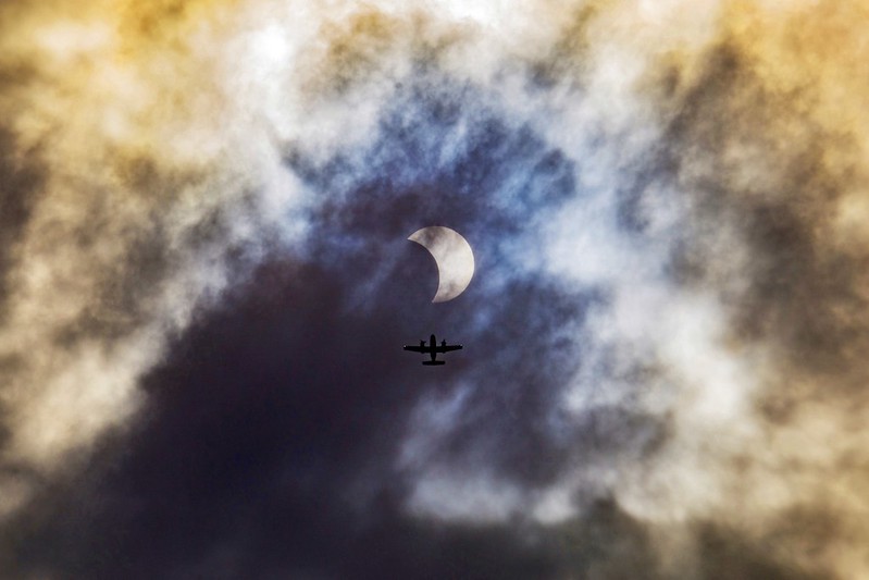 Solar Eclipse With Airplane
