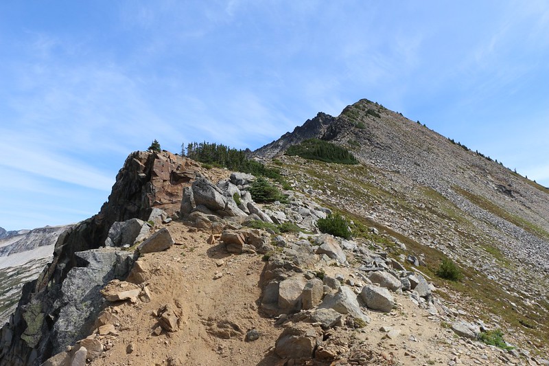 Looking up at the southwest ridge of Cloudy Peak - deadly dropoffs to the left and loose talus to the right