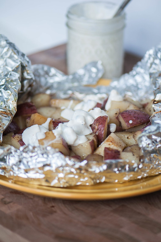 Put a fun spin on a simple side dish with these Foil Packet Potatoes with Blue Cheese Dressing. Minimal preparation and clean up make these a breeze.