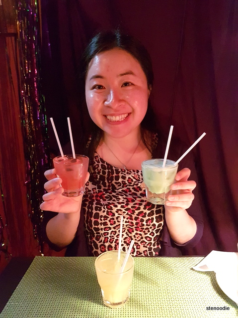  Posing with small cocktail glasses