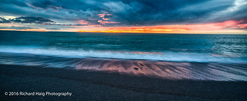 newzeland southpacificocean reflection beach sunrise nikonafsnikkor2412014ged napier gitzotripod water blacksand sky ocean richhaig nz nikond800 clouds