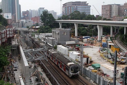 MTR East Rail train passes Shatin to Central Link works at Ho Man Tin
