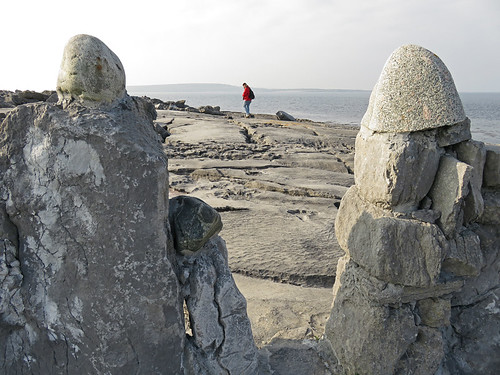 Entryway in the stone fence that leads to a rocky beach on the Aran Island of Inisheer in Ireland