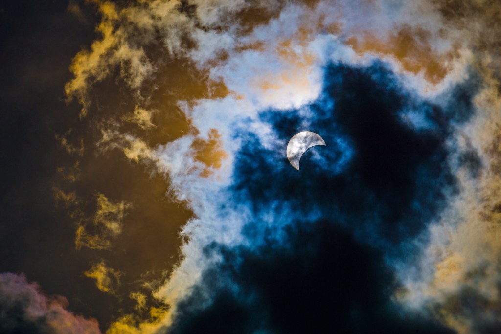 Solar Eclipse Through Clouds