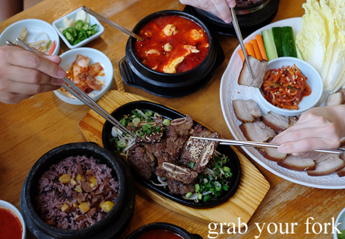 Korean bbq beef ribs, bossam, fish roe tofu soup and kimchi at BCD Tofu House in Epping Sydney