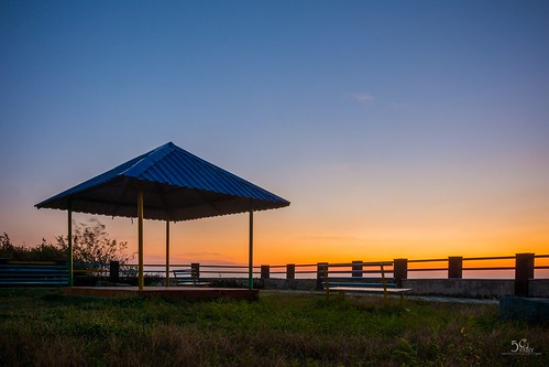 sunset sundown stilthouse hut beautiful blue sky color outdoor nikon nikond7100 d7100 nikkorafs18105mmedvr faisy5c 5ccha sea grass water park