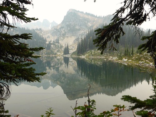 mountrevelstoke lakeeva lake mountains reflections