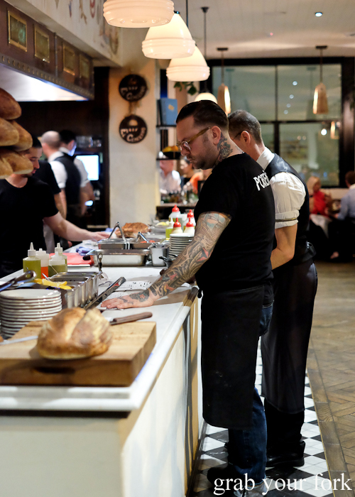 Co-owner and chef Ben Milgate on the pass at Porteno in Surry Hills