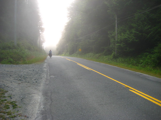 Cyclist In The Mist