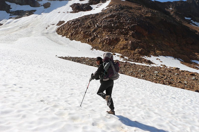 Vicki shows off her grippy MicroSpikes on the Spider Gap Snowfield Route