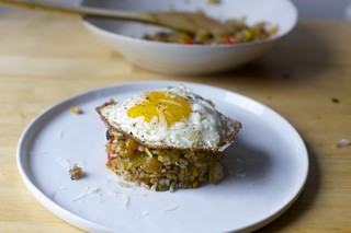 fried rice with zucchini, tomatoes and parmesan